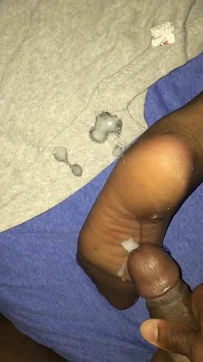 Cumshot on wife's nylon soles