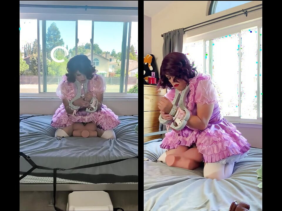Ružičasta satenska sissy sobarica jaše svoju seks lutku dok je zaključana