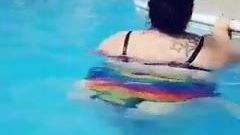 Latina with fat ass at the swimming pool