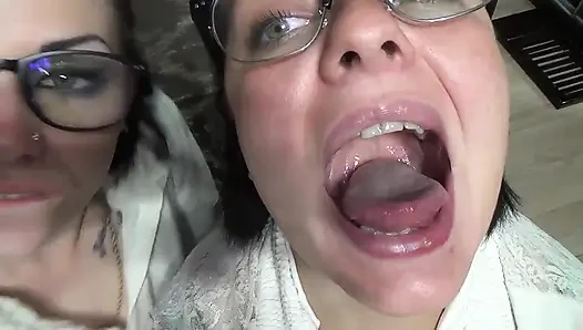 Two business women taunt you with their mouths & tongues before eating you whole!