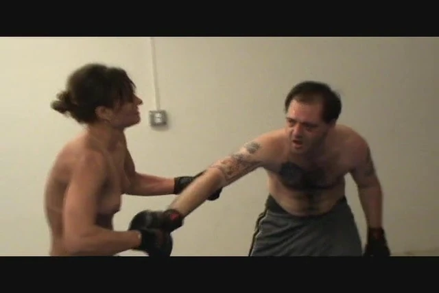 Topless Boxer Knockout Gives Him the Finger