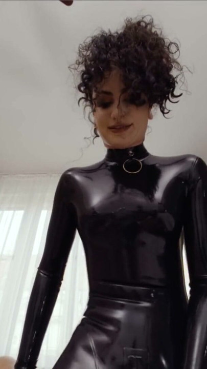 Goth Queen Lydia Black Stuns in Full Latex Bodysuit | Clip 1