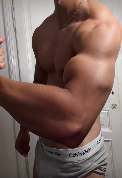 Athletic Muscle Guy Showing Off After a Workout