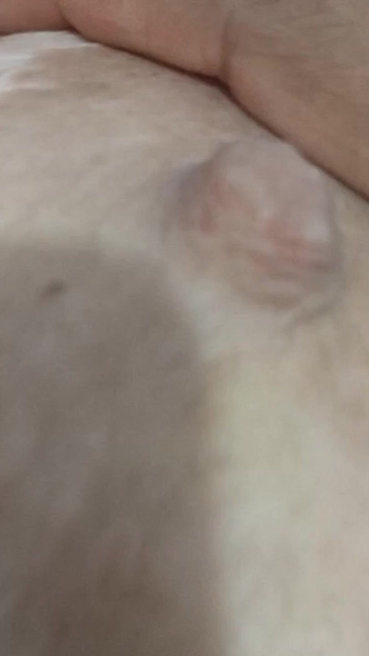 Naughty mom relaxes in bed while her stepson plays with her huge tits and fat ass. | Clip 1