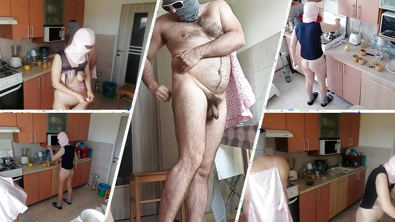 Amateur couple having fun in the kitchen. A sexy hairy brunette does the housework naked.