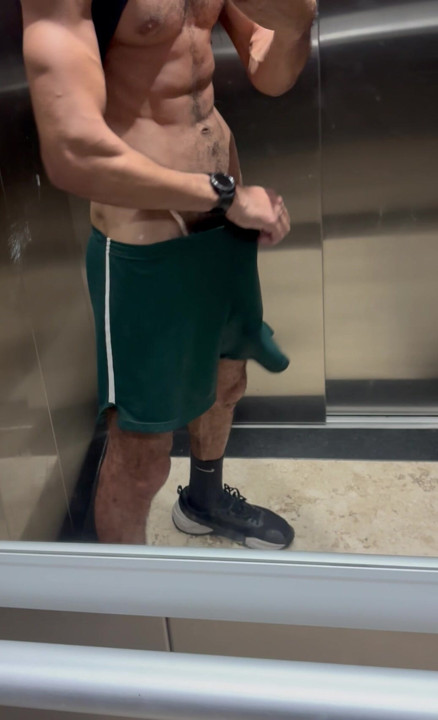 Hairy dad showing off his huge dick in the elevator
