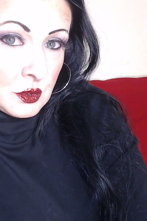 Closeup smoking red glittered lipstick