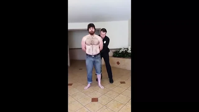 Policeman grab man's bulge