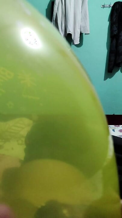 Handjob cum my pierced cock inside ballon