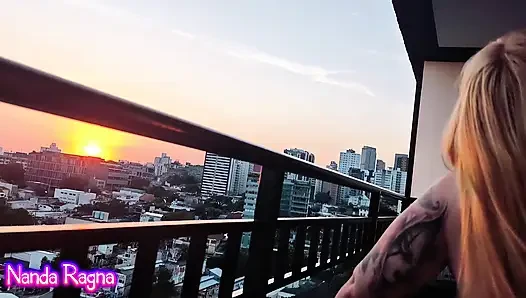 I gave a wet blowjob and sat on my neighbor's cock on the balcony of the building