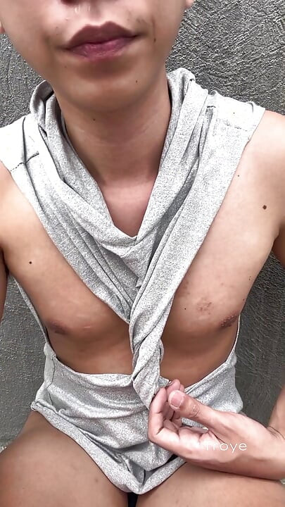 Cute Asian takes a morning walk at the park and masturbates