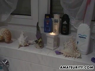 Busty amateur teen masturbates and sucks in her bath