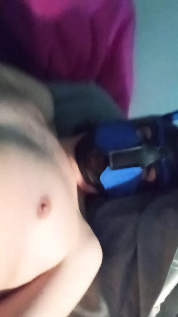 Pup in bed playing