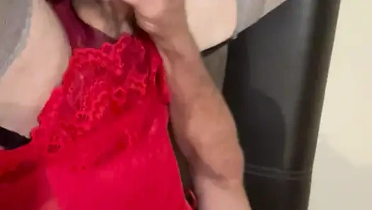 Sexy pink high heels with red corset playing