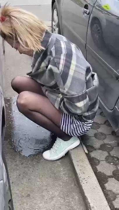 pissing like a cow in public