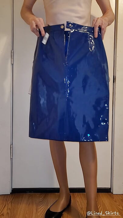 Showing off my blue PVC skirt.