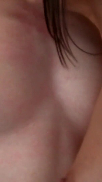 Captivating moment from "Sexy couple touching each other's bodies on a wooden horse"