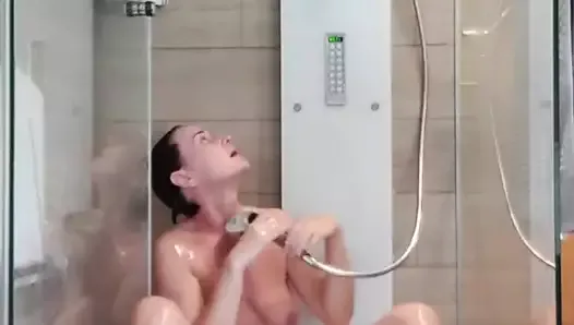 Milf having orgasms while taking a shower