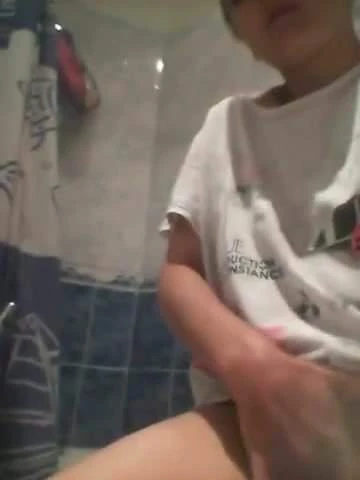 She fingers her pussy and I film her