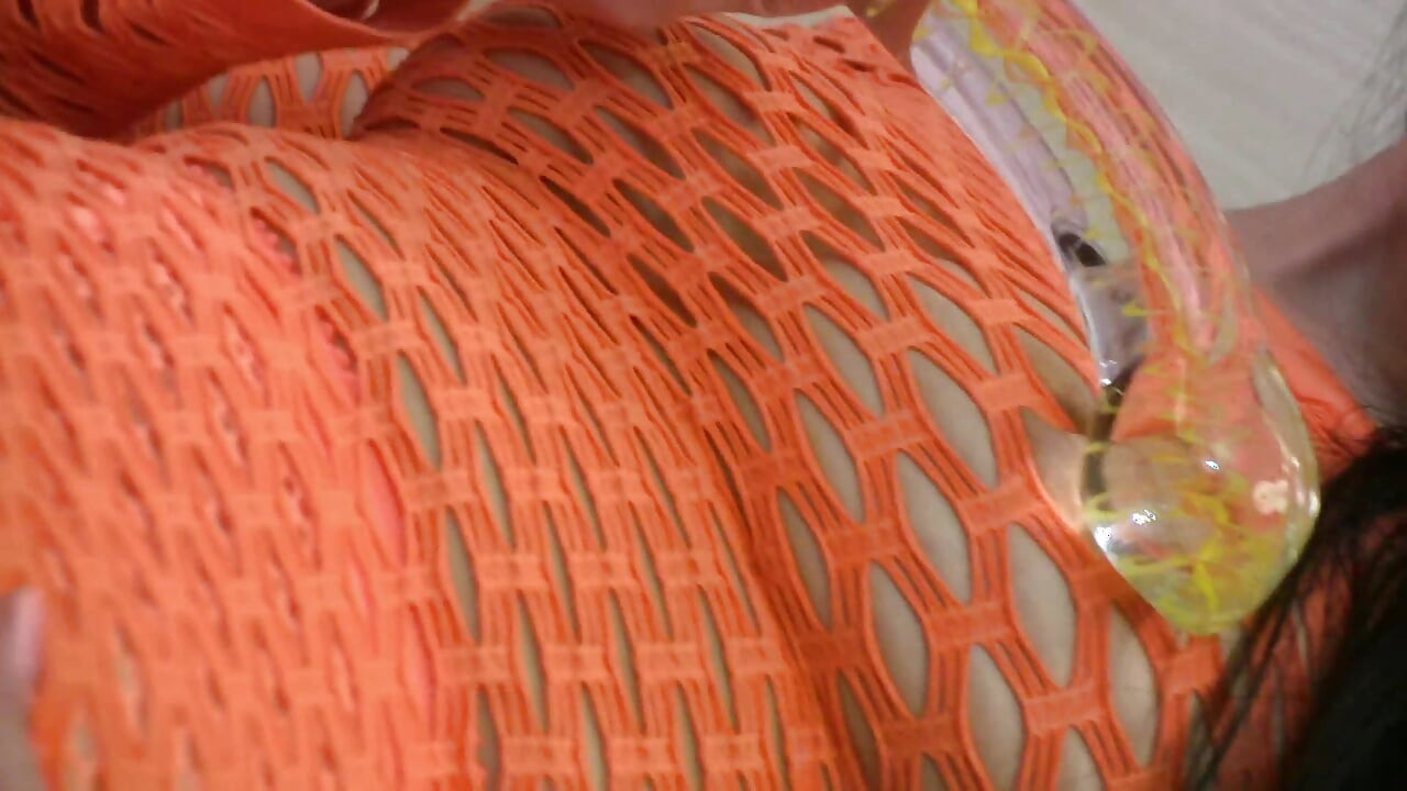 Hot teen in fishnet plays with her vibrator