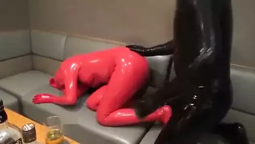 Latex Couple has sex in bar