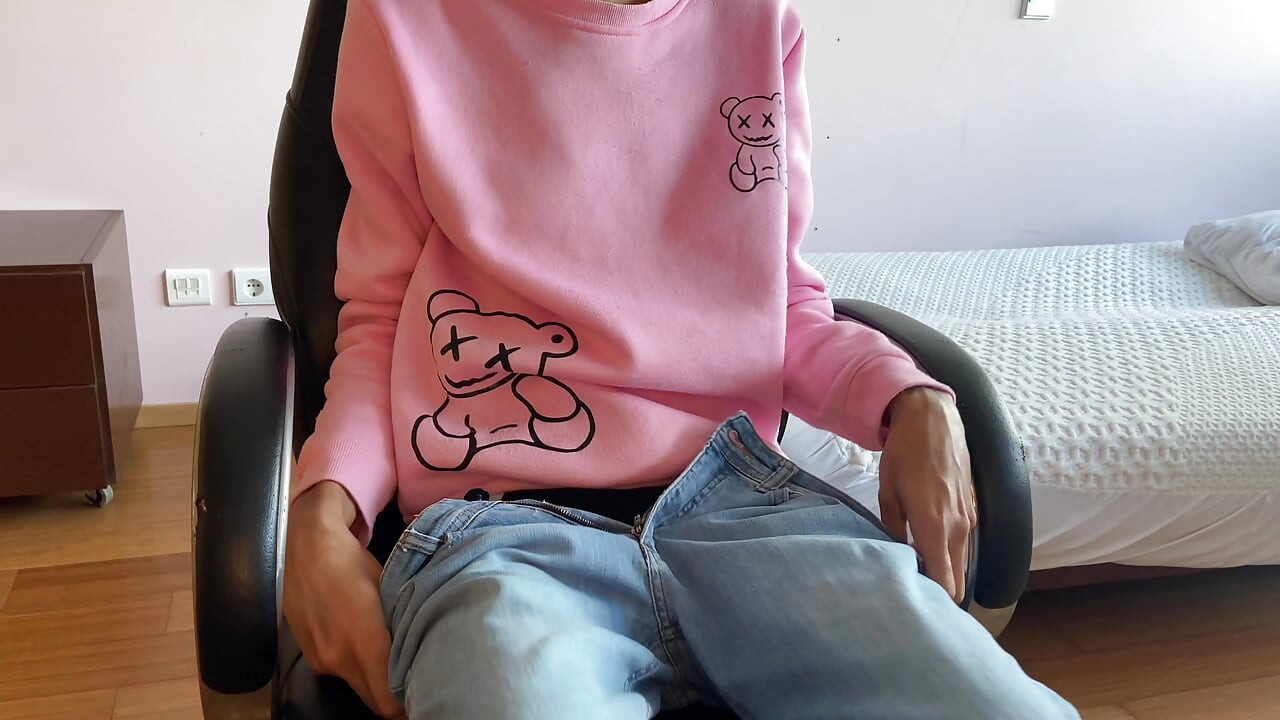 A young guy in jeans gets a hard-on and jerks off on cam.