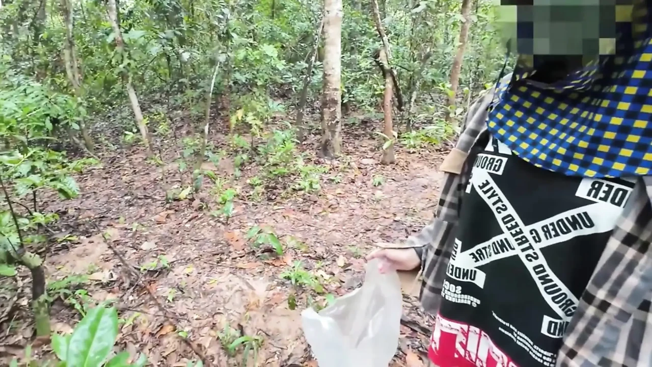Thai girls walking and talking and picking mushrooms in the forest, secretly showing in the deep forest Clear Thai voice