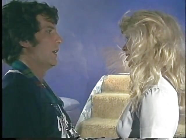 Blonde angel does a strip tease then eats cock on the staircase then fucks