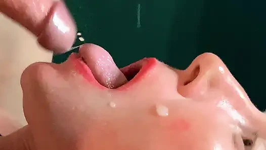 FORESKIN: She gags from huge amounts of sperm , going down her throat CLOSEUP