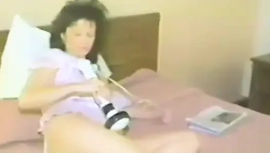 A brunette takes a big dick in doggy position