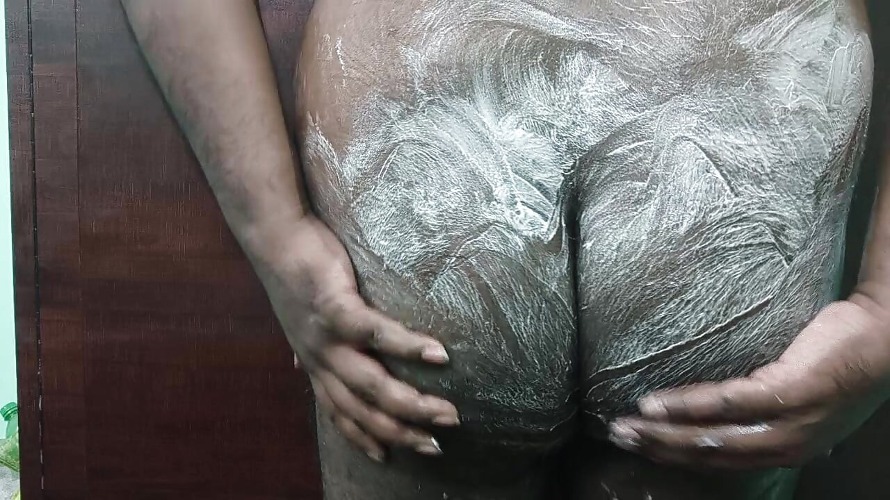 On ass applying white cream