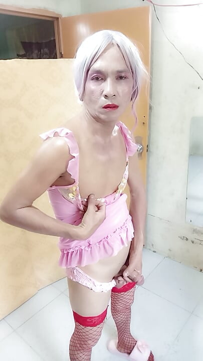 Oanh Le transgender wearing sexy and pornographic clothes standing and screaming is extremely happy