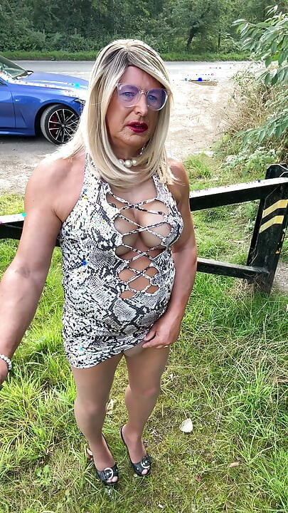 Sexy Crossdresser kellycd2022 in white animal print and pantyhose enjoying an afternoon drive
