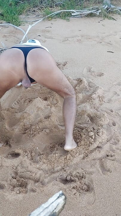 Ladysilva on the beach in panties showing off her sexy ass