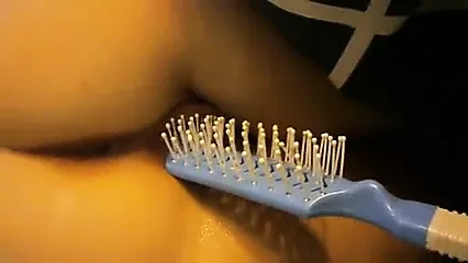 Hot chick get brush shoved up her cunt