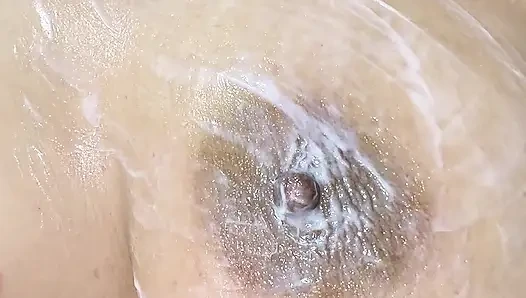 Mom massages her tits big with delicious cream