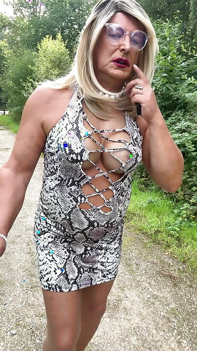 Sexy Crossdresser kellycd2022 in white animal print and pantyhose enjoying an afternoon drive