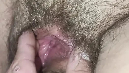 My wife's hairy wet cunt close-up