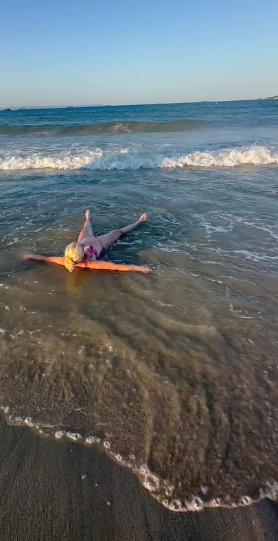 Try Not to Wet My Hair While Play with the Waves