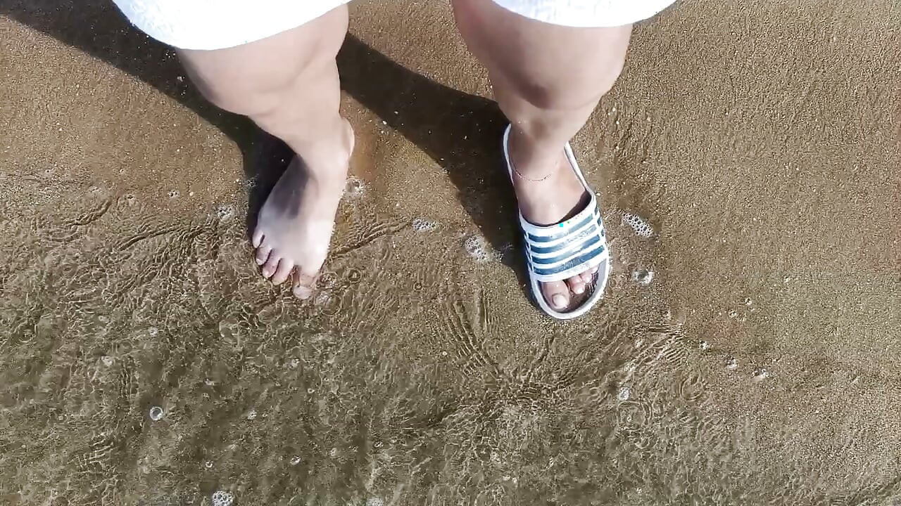Feet and the Sea Extra Slowmotion - One Foot Barefoot and Foot in Slide - Great Feet in Sea