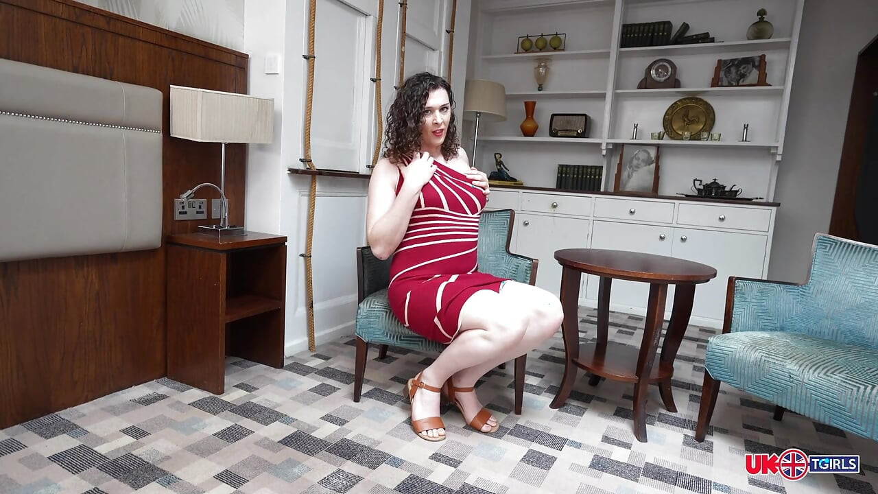 UK-TGIRLS Trans Beauty with Dark Curls Teases and Strokes in Living Room