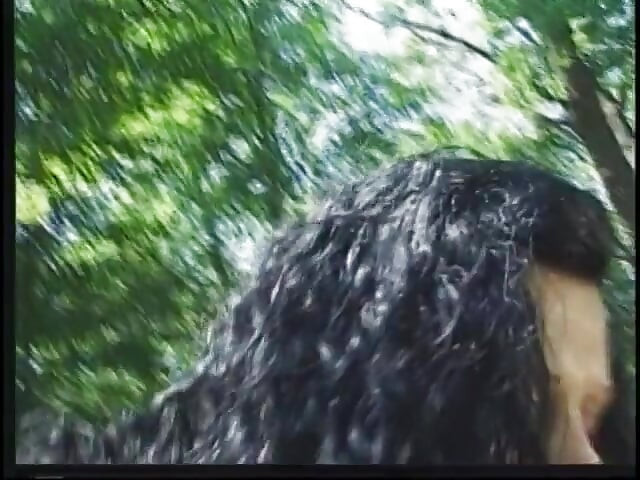 Mature brunette with big tits fucks outdoors