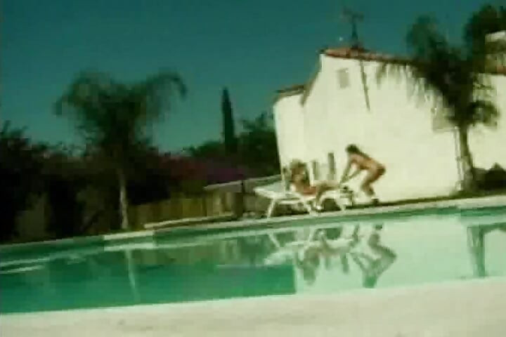 Tempting babes sharing big dildo poolside
