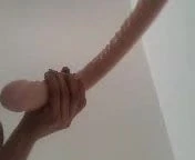 Swinging 18 inch dildo