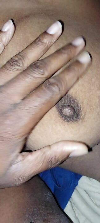 Pov of Playing with Big black tits and stiff nipples