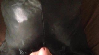 Cuming on leather pants