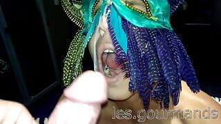 MILF with feathered mask sucks and takes HUGE cumshot on face