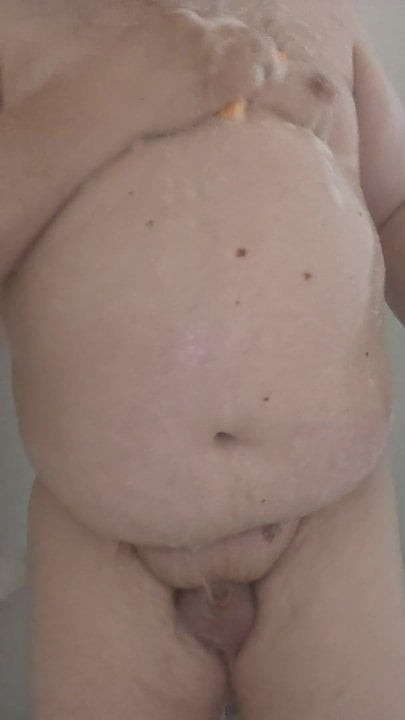 Chubby married man showers off