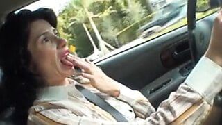 18+Woman masturbating behind the wheel of a car