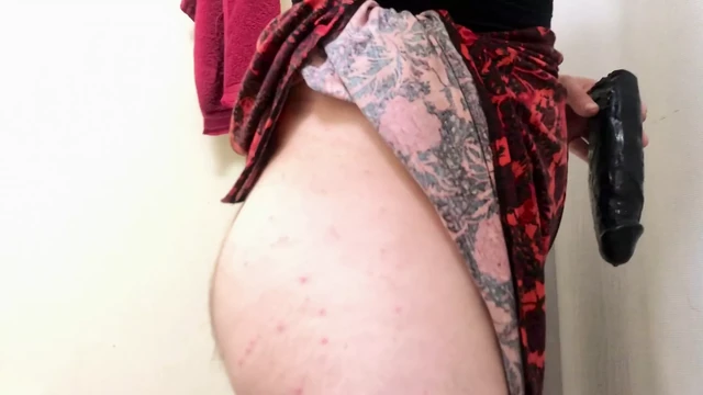 Sissy uses her dildo in the bathroom again